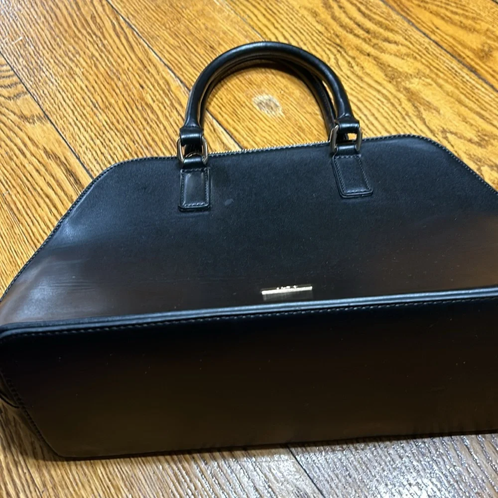 Aldo Faux leather handbag. Shoulder strap missing. Good condition. Black.